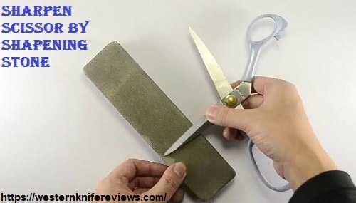 sharpening scissor by sharpening stone